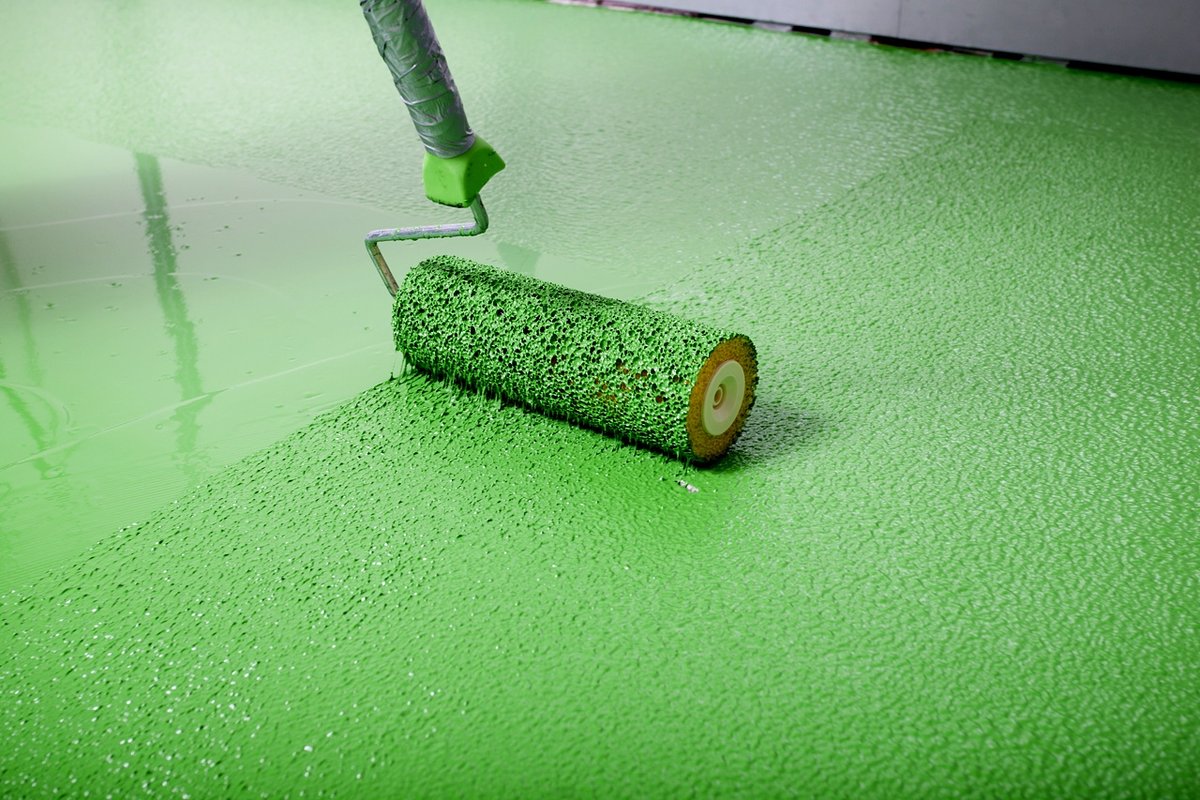 Application of structural sealant SILIPOX ®7334 in approx. RAL 6018 yellow green